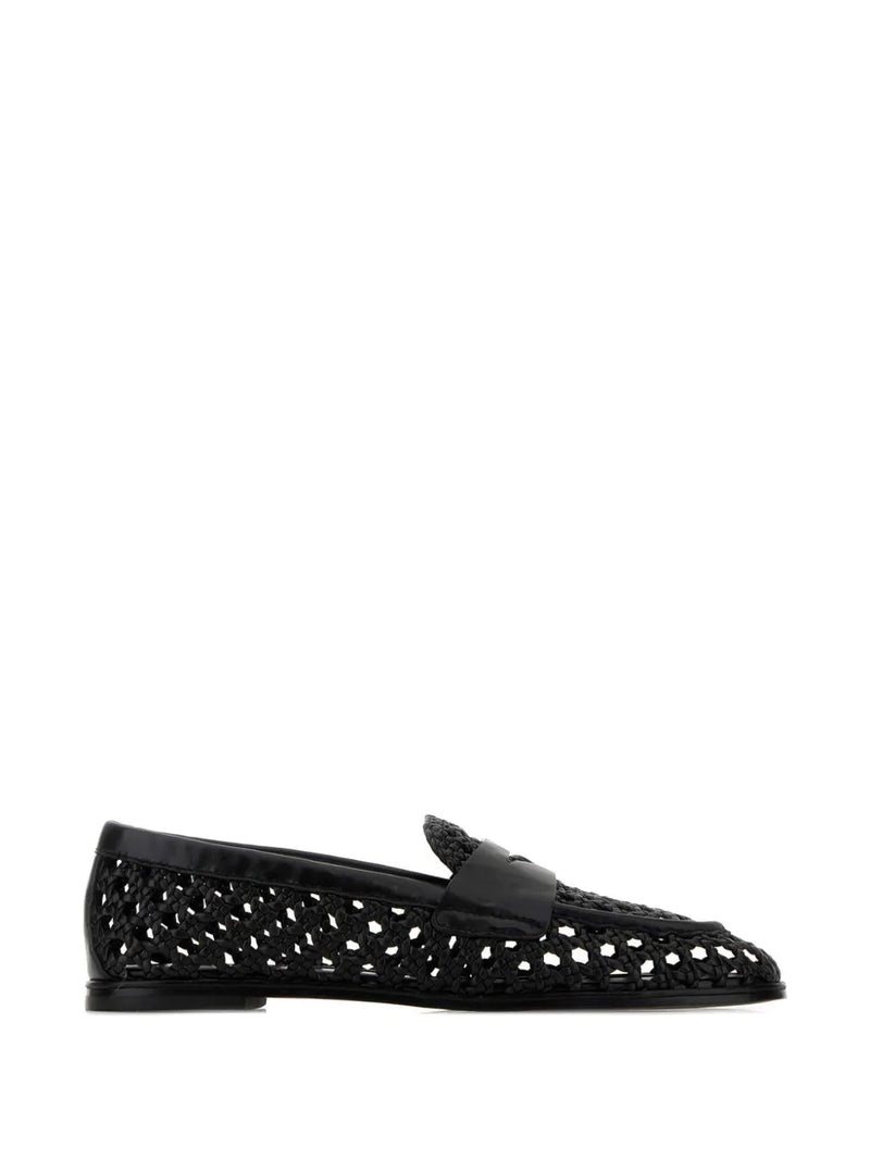 Black woven leather shoe on a white background
