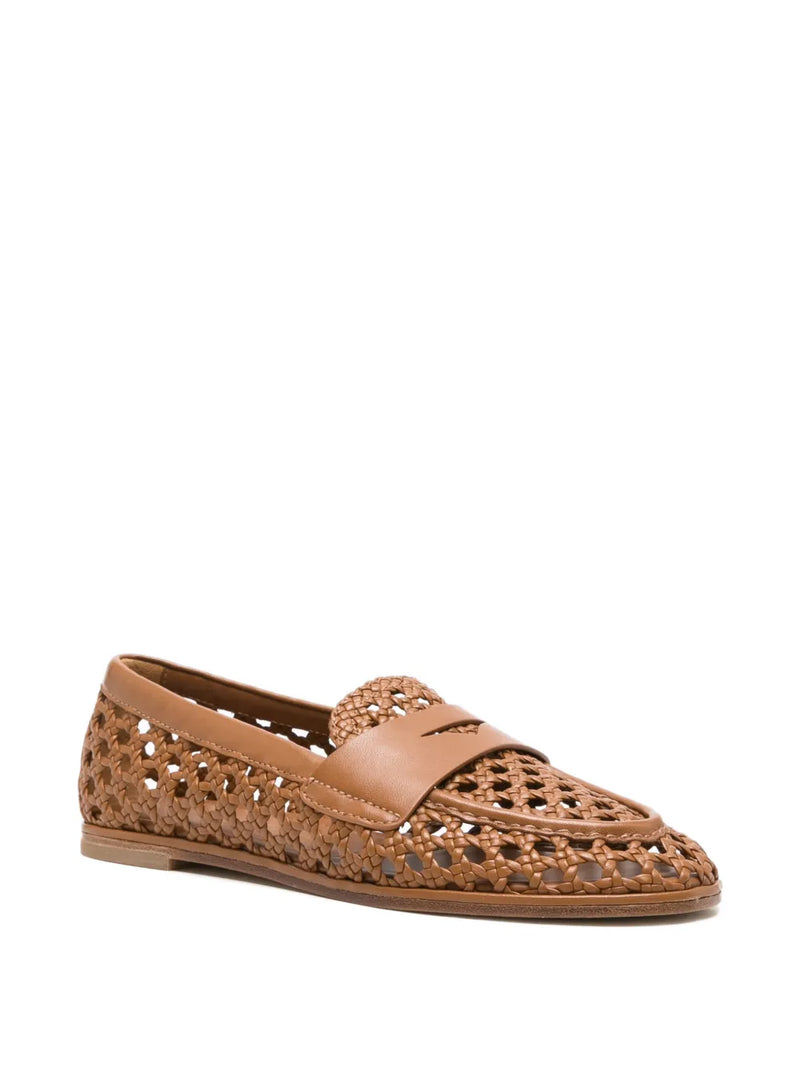 Brown perforated loafer on a white background