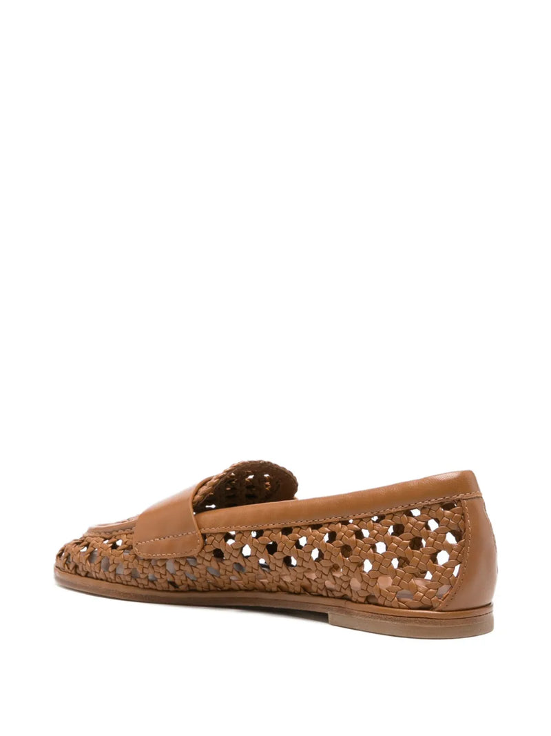 Brown perforated loafer on a white background
