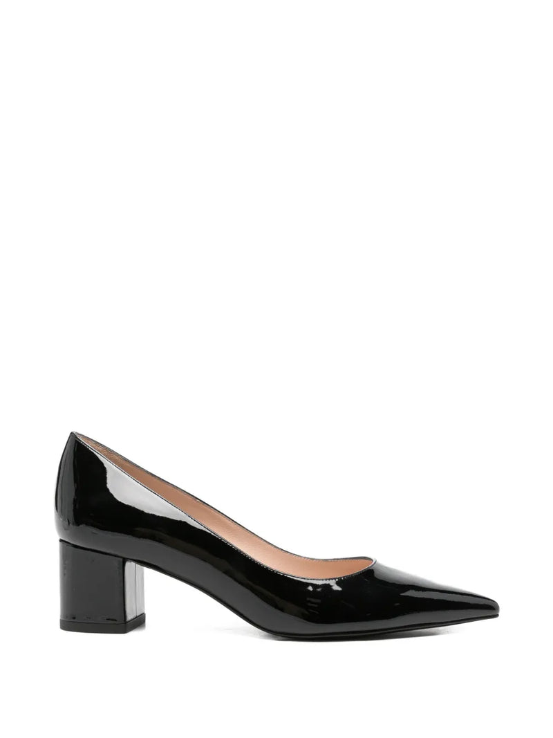 Black patent leather shoe on a white background