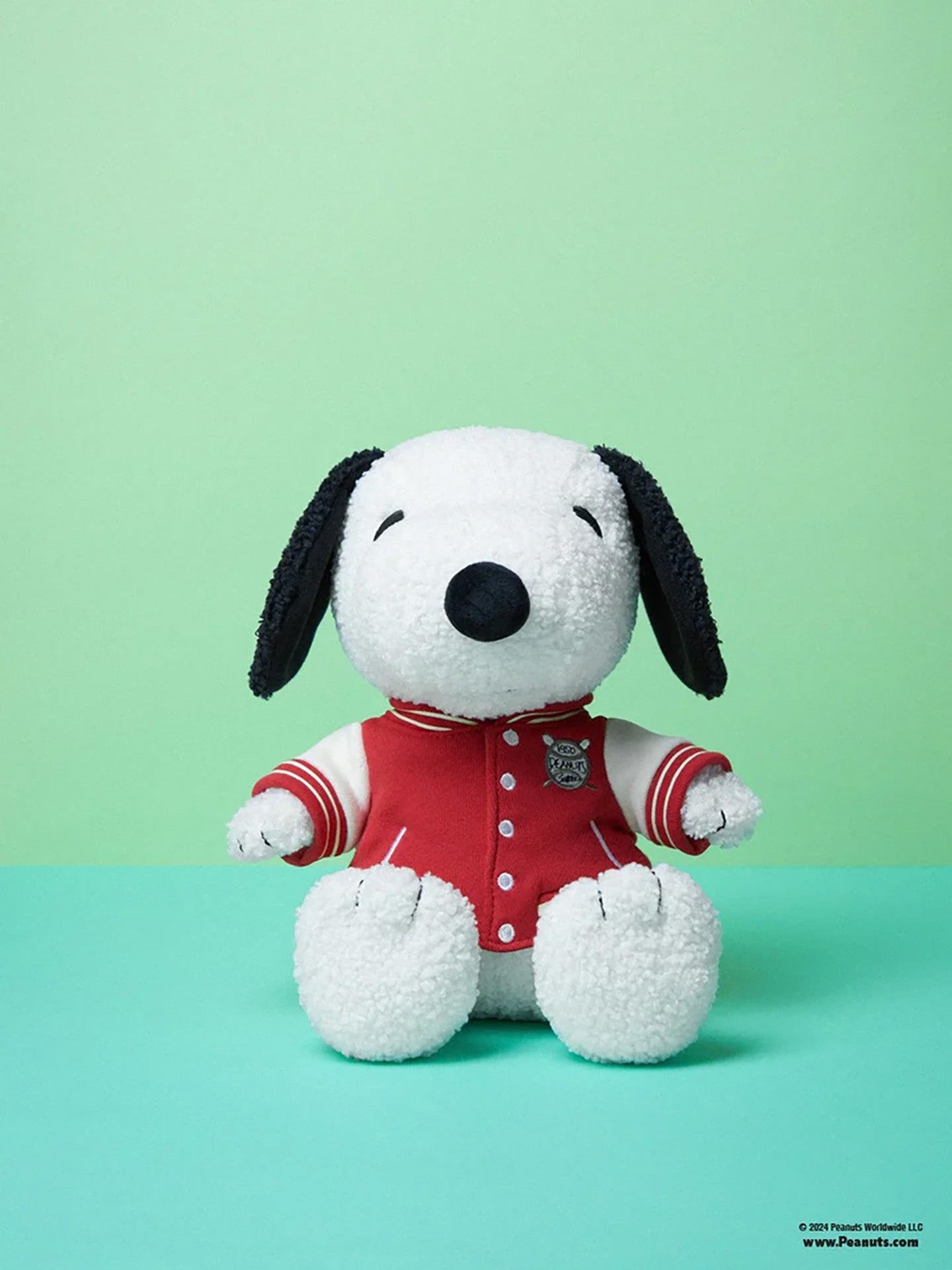 BONTONTOYS Sitting Snoopy soft toy in varsity jacket 25 cm cream coloured My o My