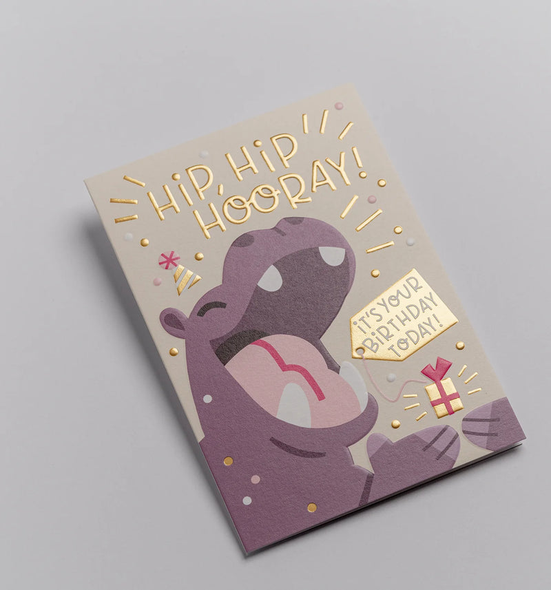 Birthday card with a hippo illustration and celebratory text on a gray background