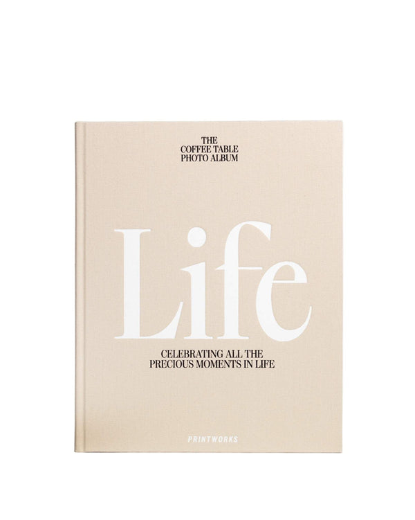 Beige coffee table photo album titled 'Life' on a white background