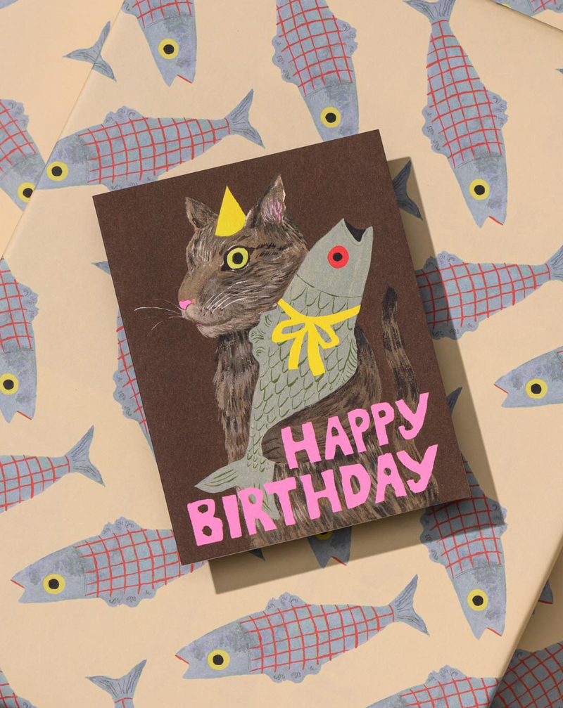 Birthday card with a cat and fish design on a patterned background