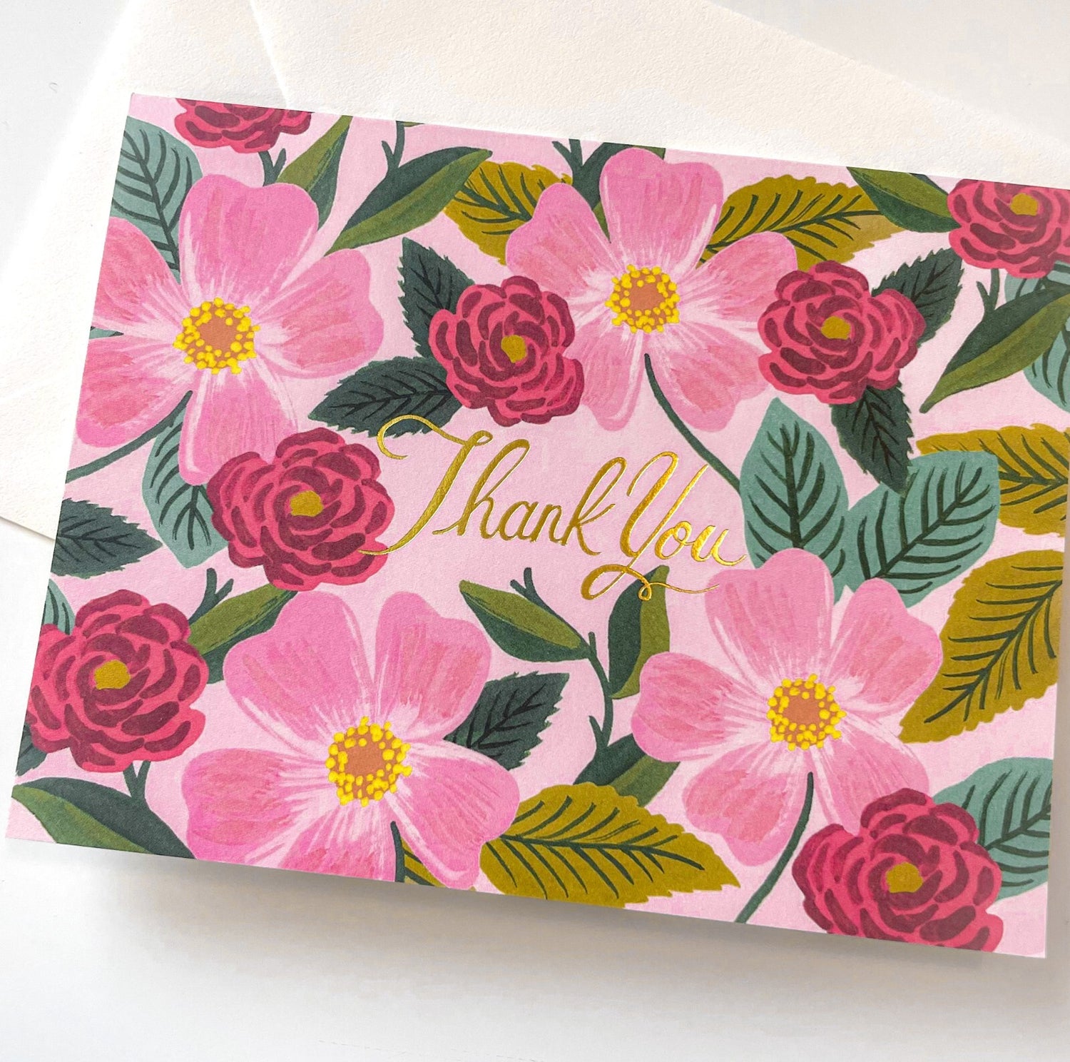 Floral card with 'Thank You' text on a white background