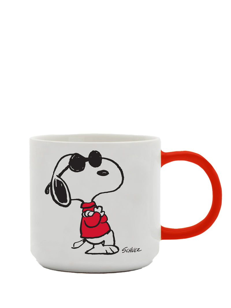 A white ceramic mug with a graphic of Joe Cool (Snoopy) wearing sunglasses and a red shirt, with a red handle.