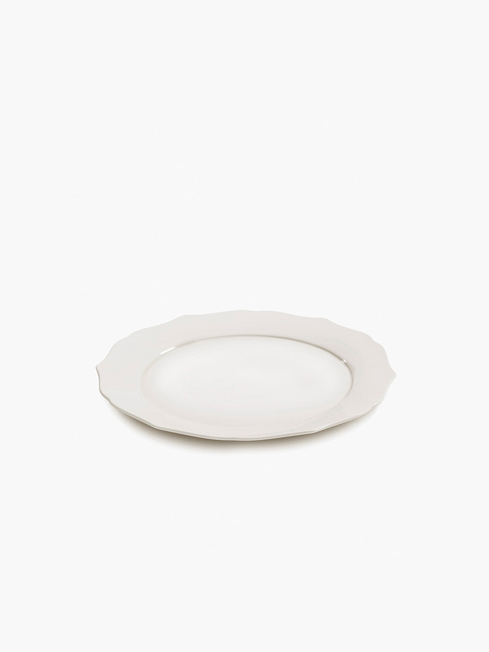 White ceramic plate on a white background