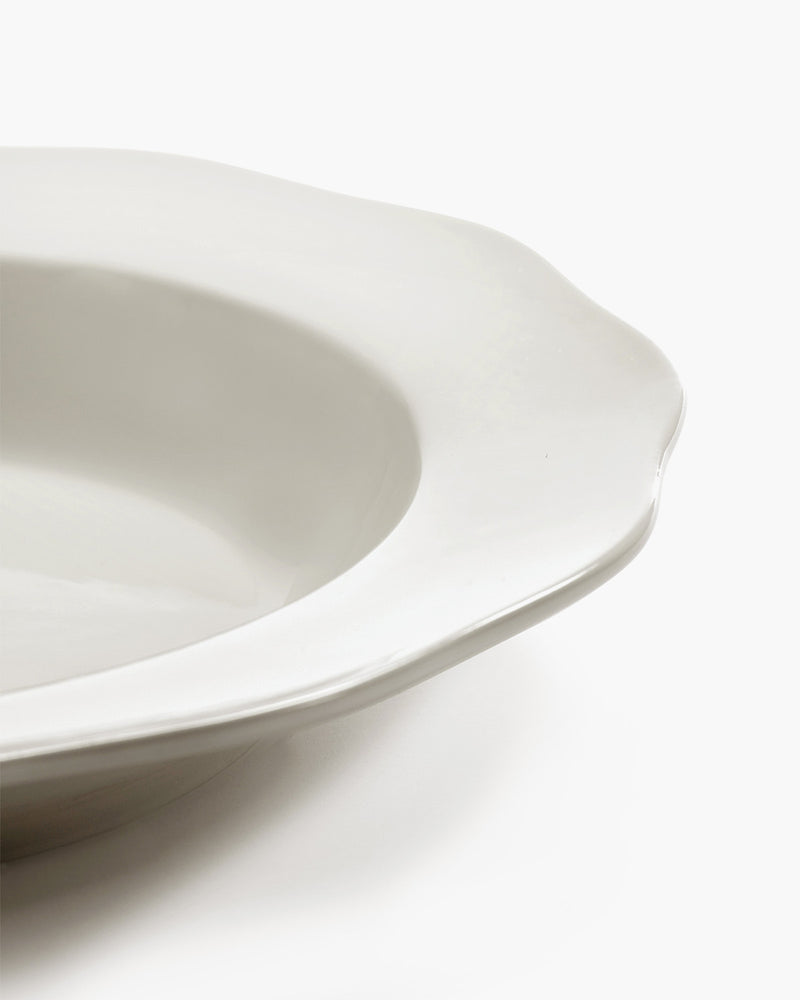 White ceramic bowl on a white background