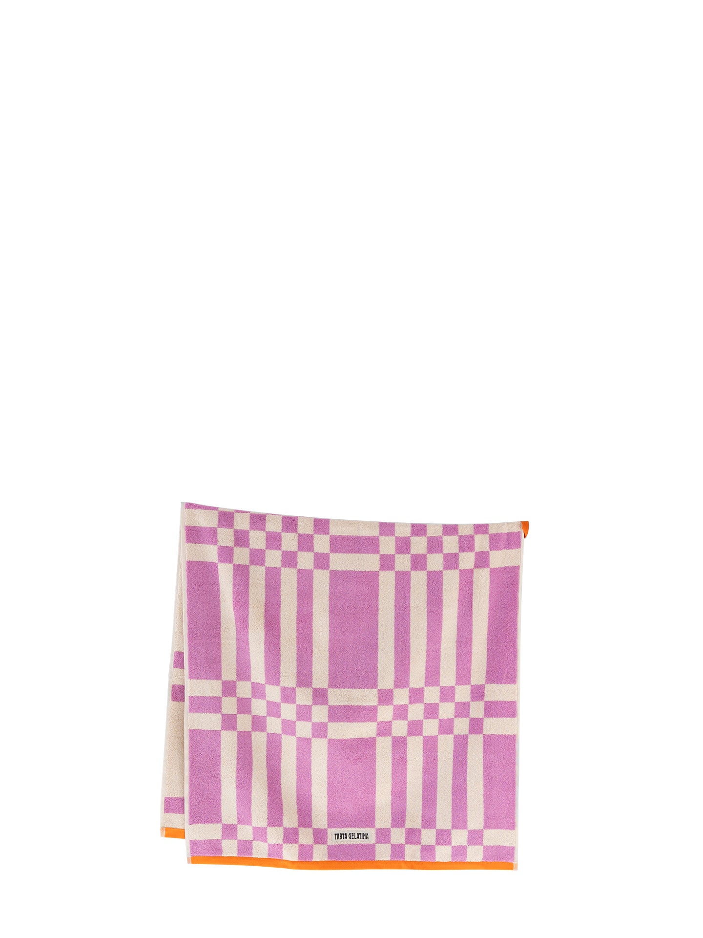 A folded square bath towel featuring a pink and off-white plaid pattern with a thin orange border and a small orange loop at the middle and an off-white Tarta Gelatina brand label at the bottom.