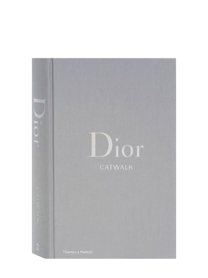 Grey cloth-covered book titled 'Dior Catwalk' is a 28 cm x 20 cm and 5 cm thick coffee table beauty.