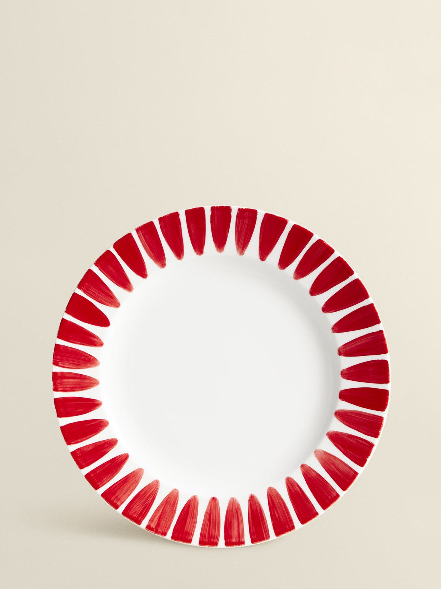 Red dessert plate with handpainted border