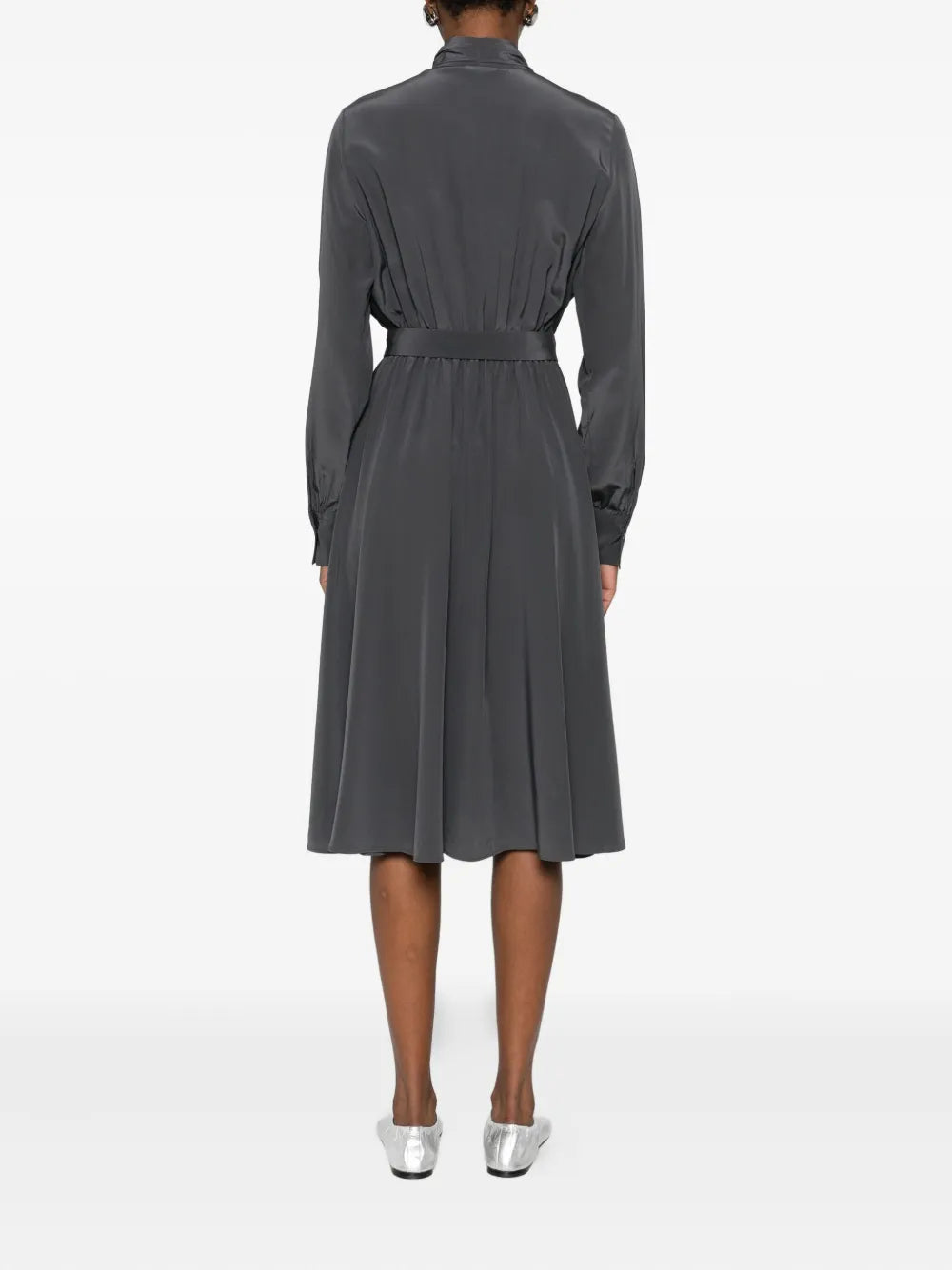 Gray dress worn by a model on a white background