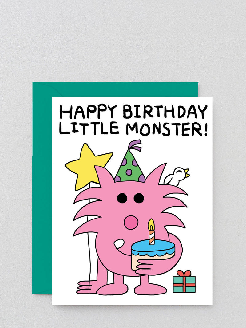 Birthday card with a pink monster holding a cake, surrounded by birthday decorations on a gray background.