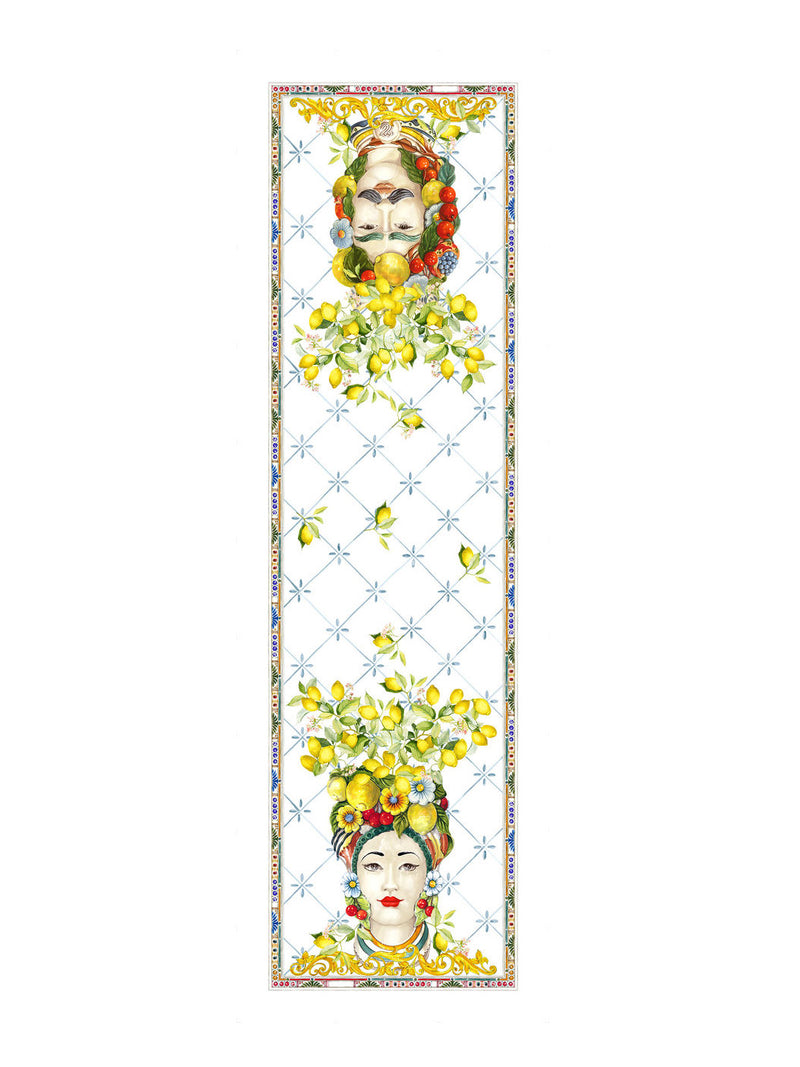 Tablecloth runner with lemon and Moor head design on a white background