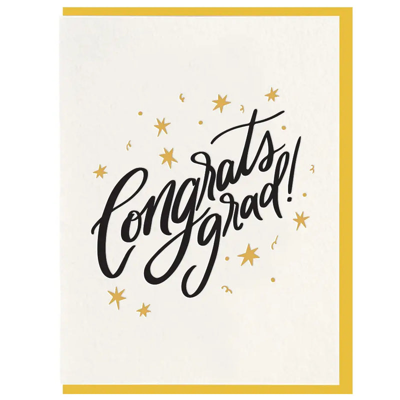 A hand illustrated greeting card with the text 'Congrats Grad!' surrounded by stars, on a white background with a yellow envelope.