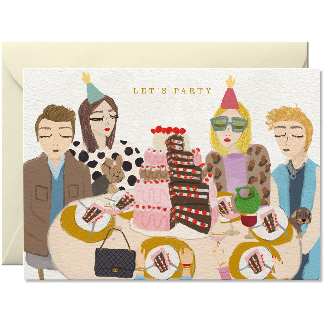 A greeting card with an illustration of people around a birthday cake with 'LET'S PARTY' written at the top. The card is placed against a beige background, possibly an envelope.